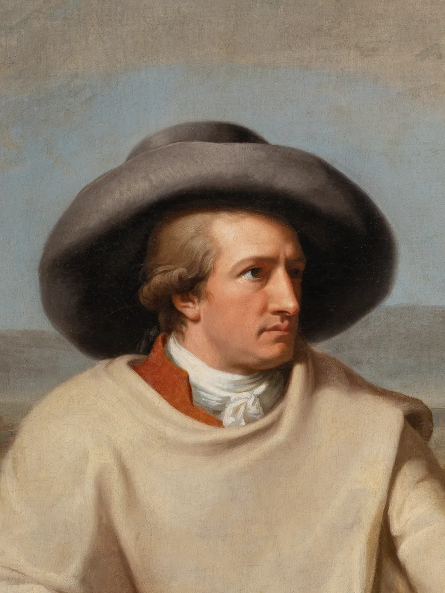 A detail of an oil painting of 1787 by Johann Heinrich Wilhelm Tischbein, showing the sitter in a broad hat and travelling cloak against a Roman landscape.